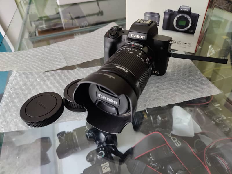 Canon M50 with adopter and 18-55mm STM lens 5