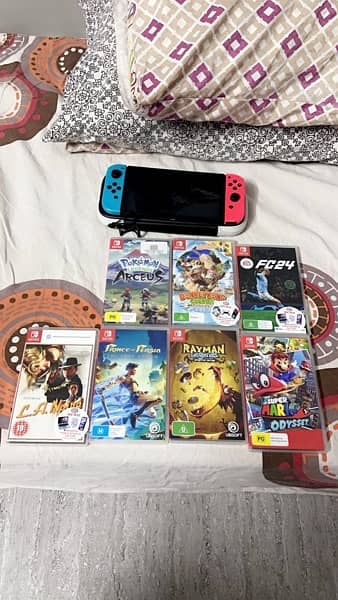 Nintendo Switch OLED + 7 Games and all accessories 0
