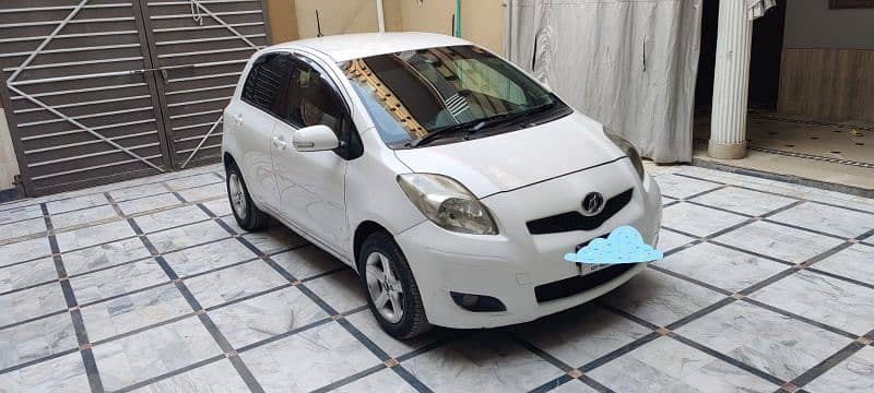 Toyota Vitz 2010/2014 white islambad registerd 1