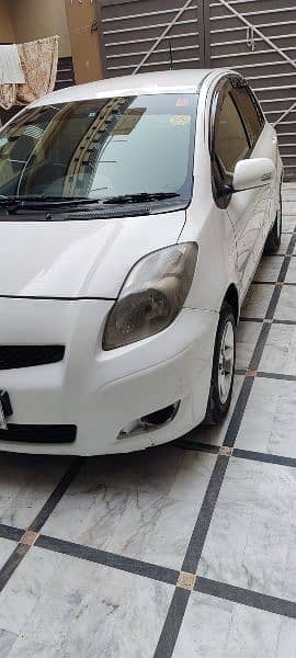 Toyota Vitz 2010/2014 white islambad registerd 3
