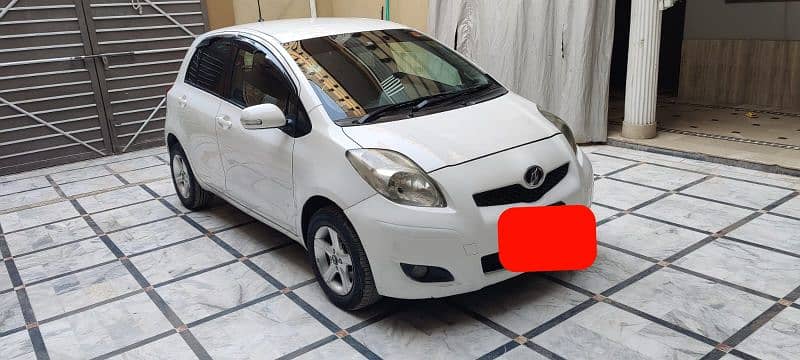 Toyota Vitz 2010/2014 white islambad registerd 5