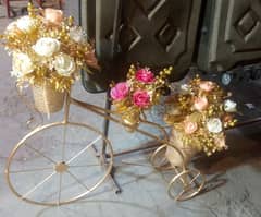 Metal rod Cycle with flowers arrangement