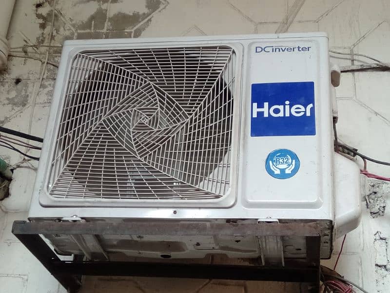 1 year use. white colour. haier. condition new 1