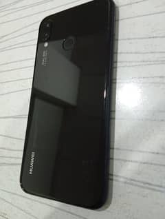 Huwaei p20 lite shiny black 64gb Only serious person call  Almost new.