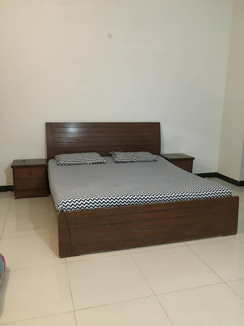 King size used Bed with mattress and two side tables 1