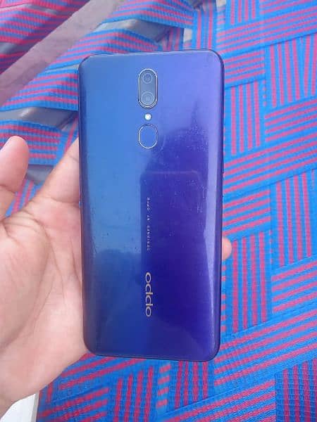 Oppo F11 mobile USD rabta karre full ok charge de warsara bos de 3