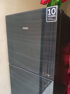 Almost new  Haire Glass door fridge only 8 moth used