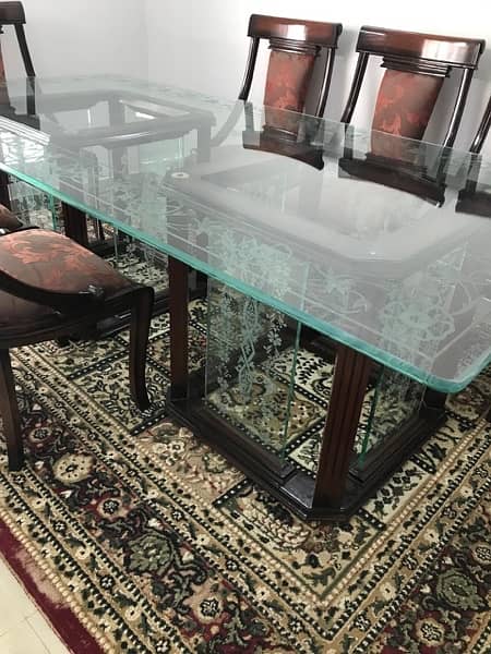 Good condition dinning table with 8 chairs 3