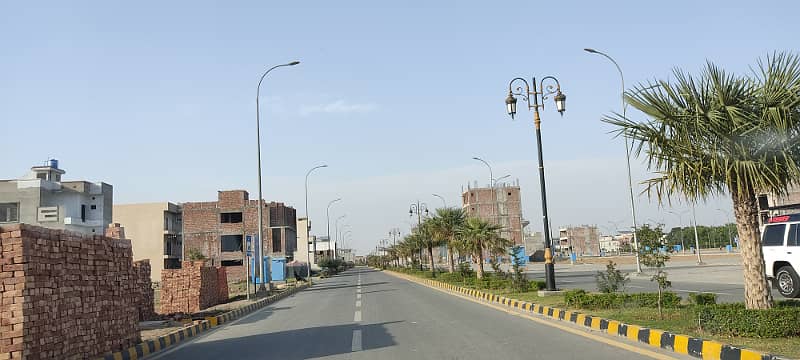 10 MARLA PLOT FOR SALE LDA APRROVED ON 2 YEAR EASY INSTALLMENT PLAN IN ETIHAD TOWN RAIWIND ROAD LAHORE 0