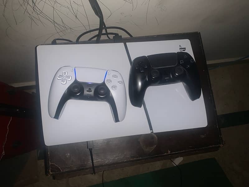 ps5 slim with 2 controllers 2