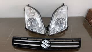 SWIFT  RIGHT SIDE HEAD LIGHT ORIGNAL STANLEY. & GRILL 100% 0RIGNAL