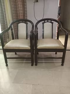 two fancy wood chairs in good condition