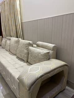 L shaped 9 seater modern designed sofas, with leather table and dewan