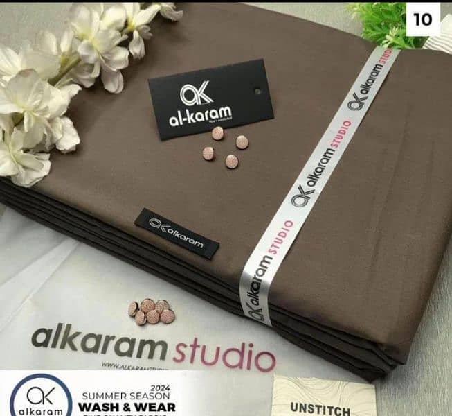 allkaram and Gull Ahmed/wash and wear/unstitched suites/men collection 6