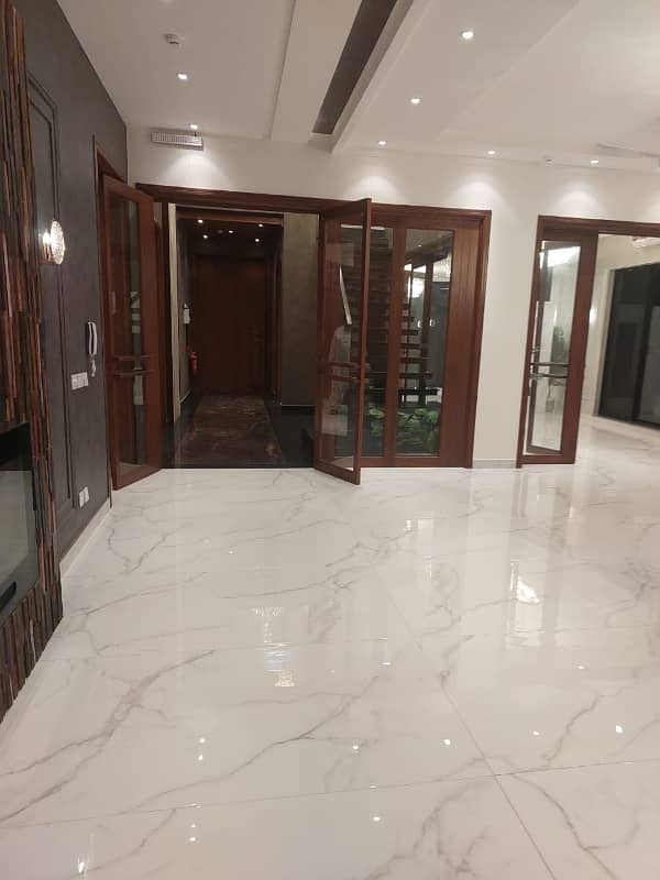 Hot Location 1 Kanal Luxurious Like New Fully Basement Bungalow Available For Rent in DHA Phase 6 Block L 18
