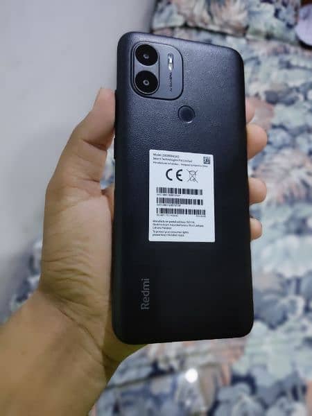 Redmi A2+  with box and charger 2
