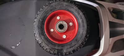 UNITED SCOOTY SIDE WHEEL (SOLID TYRE, ONE PAIR IN RED COLOR)
