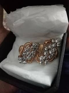 Chandi earrings.