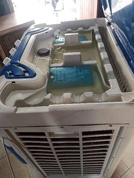 Intech company  Air cooler one day use urgent sale need for money 1