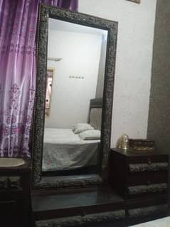 king size bed with side tables and dressing table
