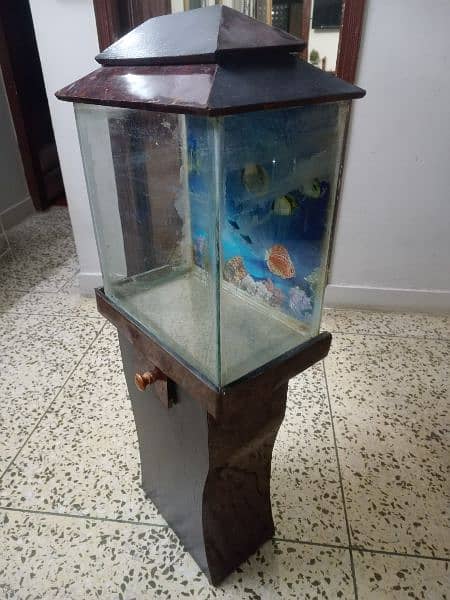 Fish aquarium with wooden stand. 1