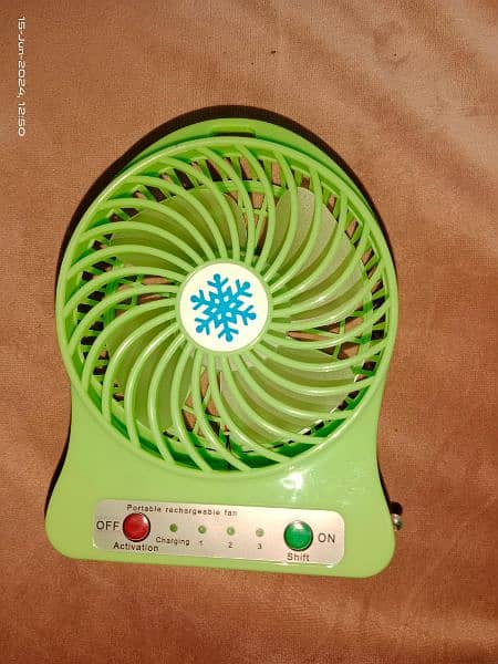 mini charging fan with battery 2 adad 1