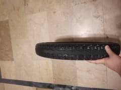 Rear service tyre of 125