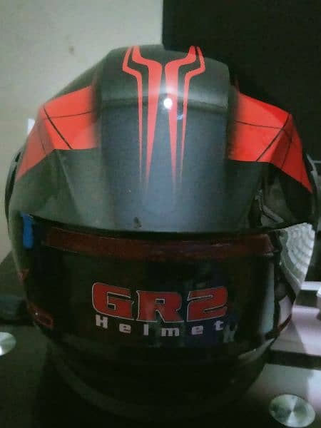 Gr2 helmet red and black with good padding 2