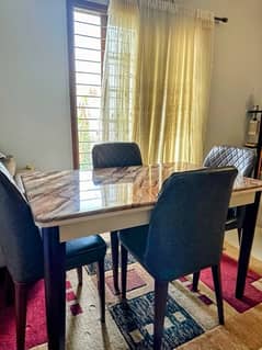 Marble top dining table with 4 leather chairs