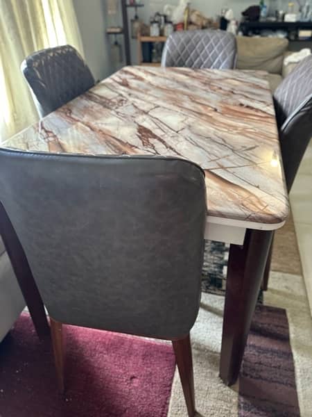Marble top dining table with 4 leather chairs 3
