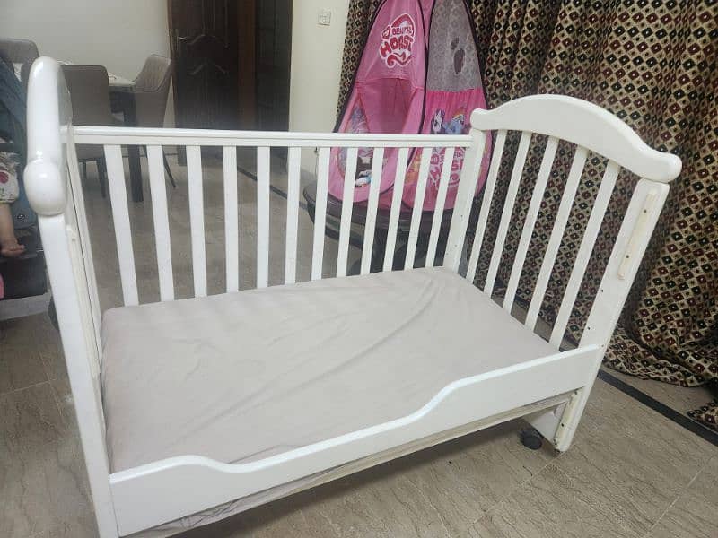 baby cot branded for urgent sale. 10/10 condition. 5