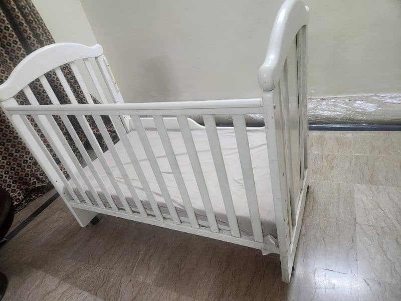 baby cot branded for urgent sale. 10/10 condition. 6