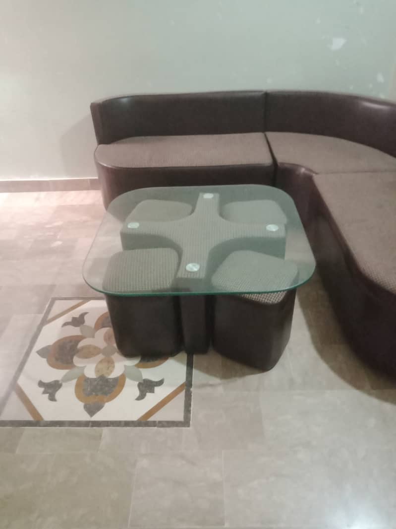 Table with 4 seat's stools L shape sofa. 4
