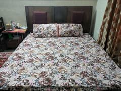 king size bed with two side tables 0