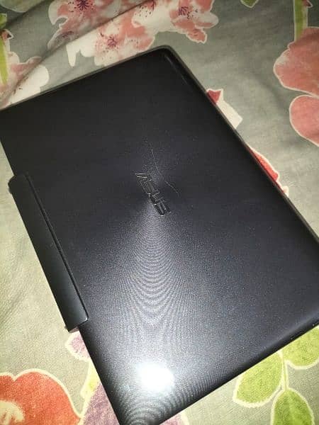 ASUS MINI 2 IN 1 LAPTOP 6