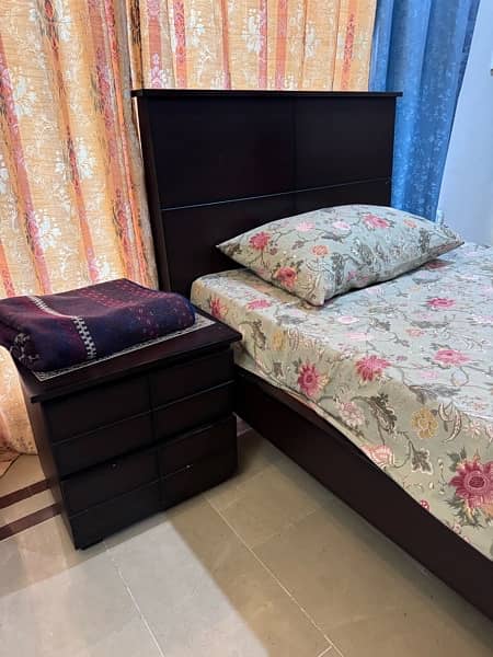 single bed with side table 0