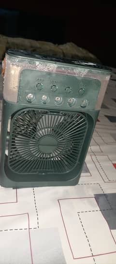 Portable mini AC cooling fan