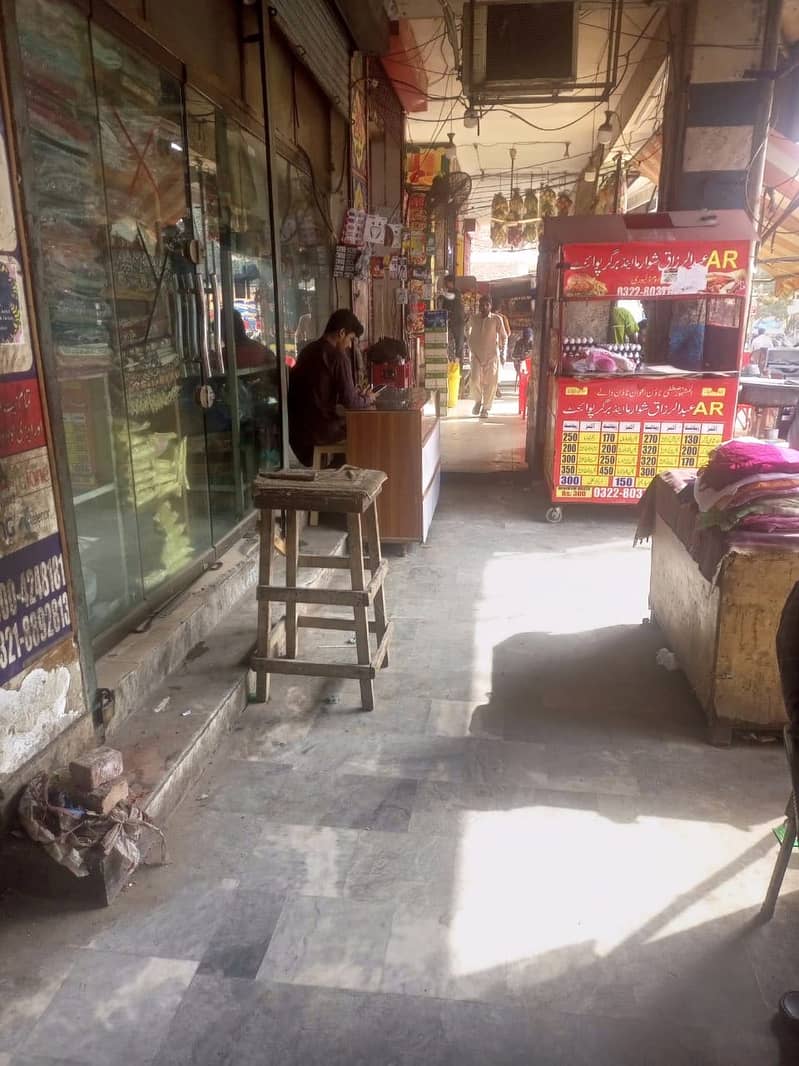 Shop for sale in johar town tariq center ground floor with 14k rent coming 0