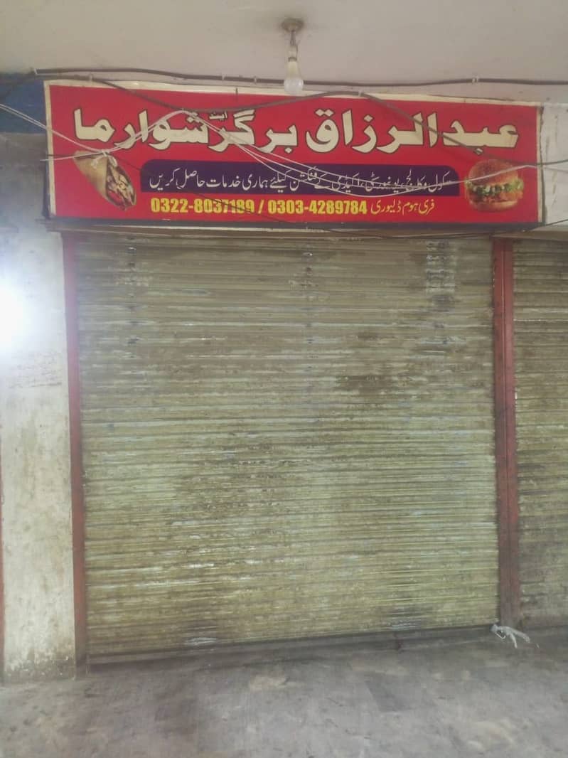 Shop for sale in johar town tariq center ground floor with 14k rent coming 3