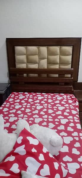 single bed with one side table 1