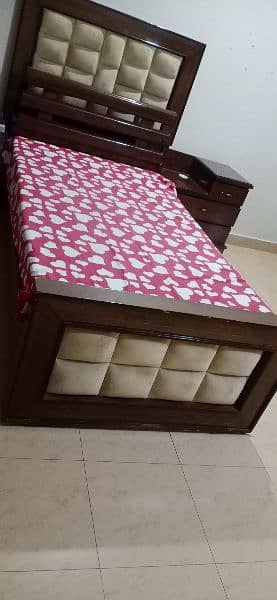 single bed with one side table 2