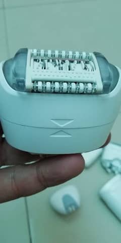 Braun slik epli 7 hair removal machine rechargeable Ali 03092800668