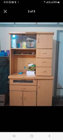 itsa spacious book shelf and also having multiple draws. and cabinet .