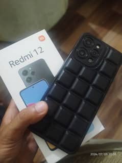 Redmi 12 Six Month Warrenty With Complete Box  Contact 03120519427