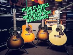 BIG OFFER get two acoustic guitar get one free music classes availabl