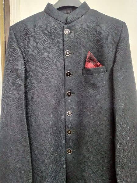 Black Sherwani self-printed with Maroon banarsi Kulla. 1