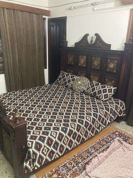 wooden bed with dressing table in rough condition 3