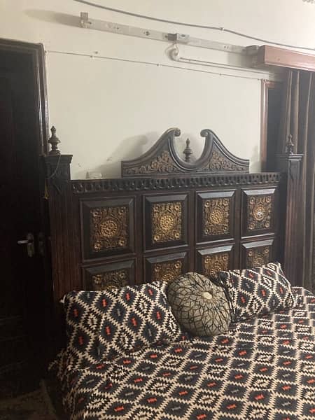 wooden bed with dressing table in rough condition 4