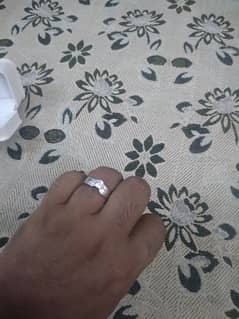 A brand new platinum ring with diamond avlbl.