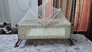 Baby cot and swing with mosquito net of Tinnies Brand